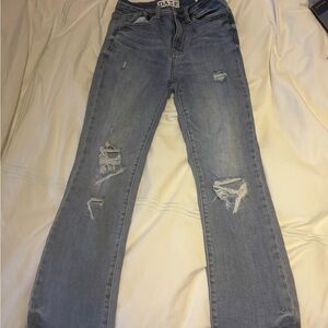 DAZE Denim light washed straight leg distressed jeans.